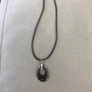 Hematite Oval Pendant. Includes blk cord necklace.